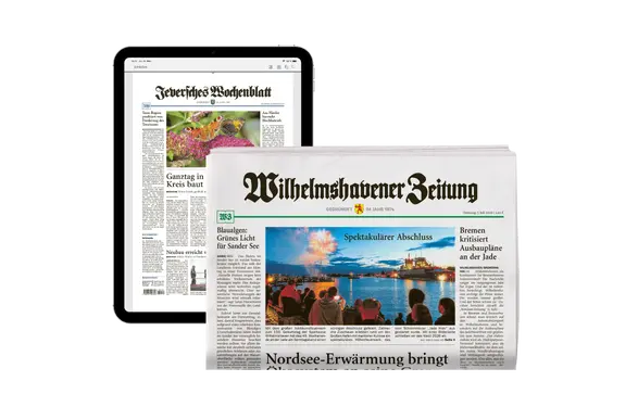 Tablet mit einer Artikelseite und eine Zeitungsrolle der Wilhelmshavener Zeitung
